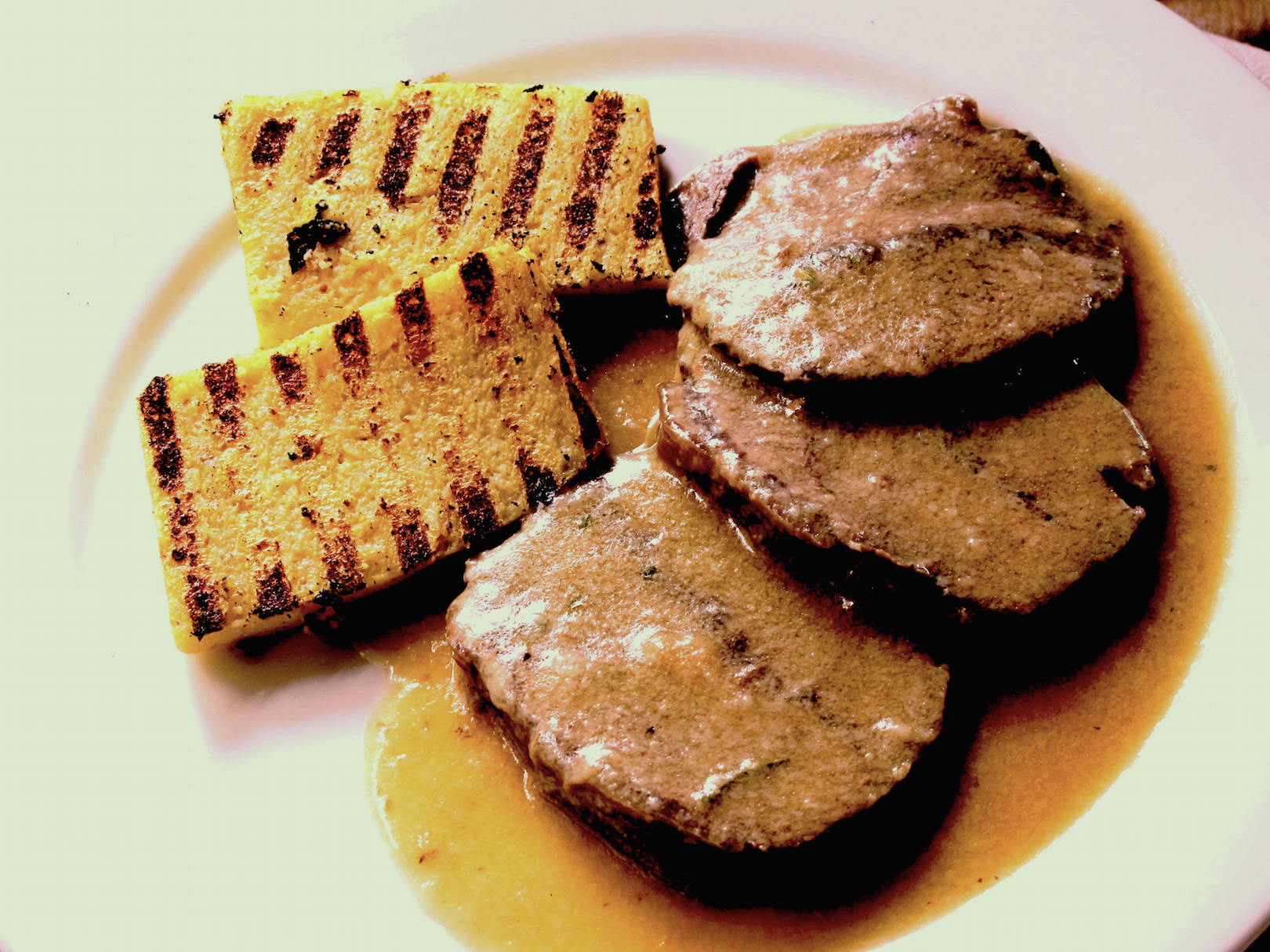 The traditional 'manzo all'olio' served with polenta © Cesare Zucca 2015